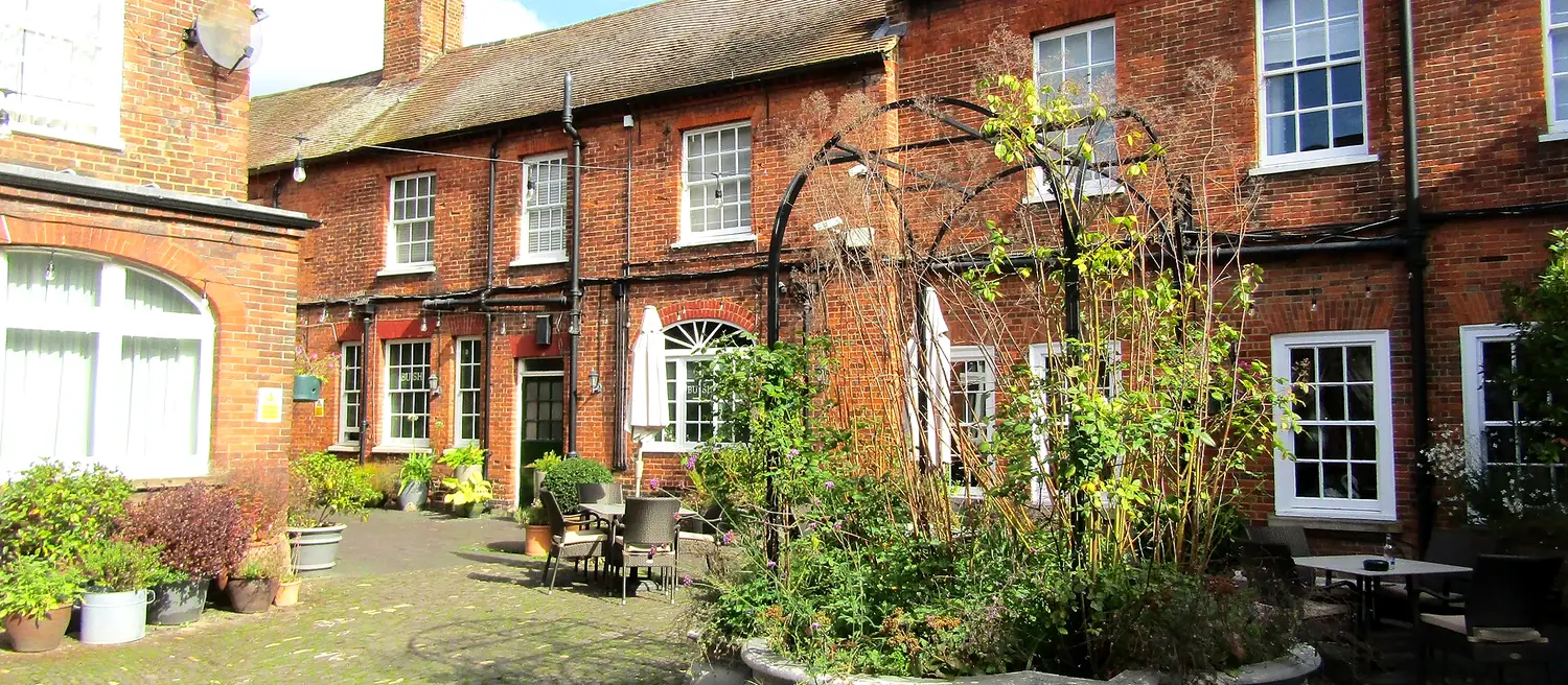 Farnham Hotel Taxi Service: The Bush Hotel courtyard, Farnham